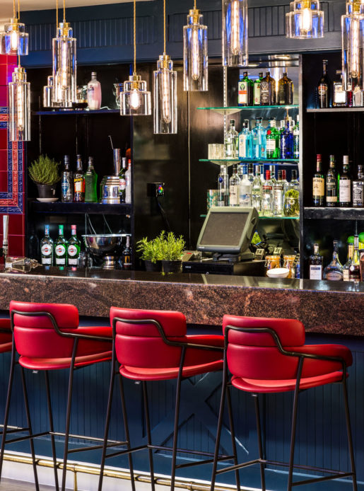 The Brasserie Bar at Mercure Swansea Hotel, red bar stools, blue bar, glass light fixtures