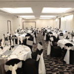 Lakeside Suite at Mercure Swansea Hotel set up for a wedding with black and white decoration.